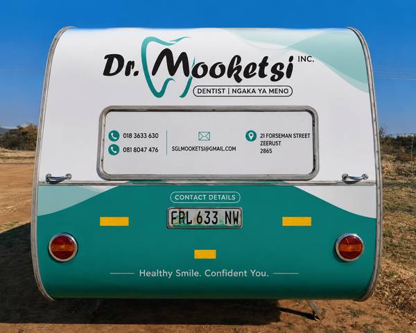 Back of the mobile clinic with contact details